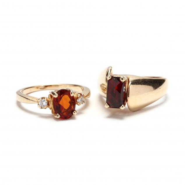 two-gold-and-gemstone-rings