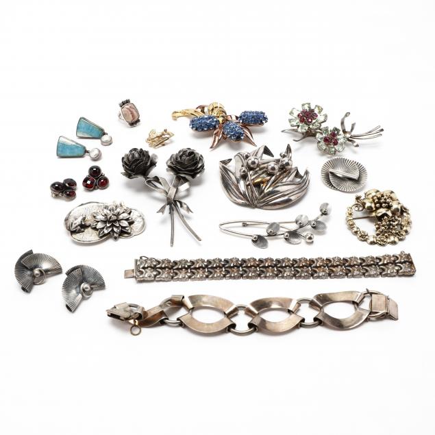 a-large-group-of-designer-silver-jewelry-items