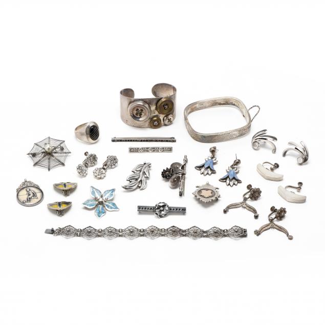 group-of-silver-jewelry-items