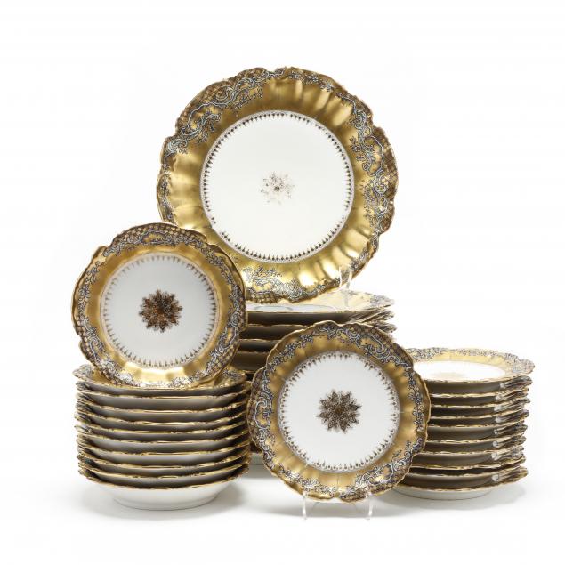 34-pieces-of-gilt-limoges-porcelain-table-ware