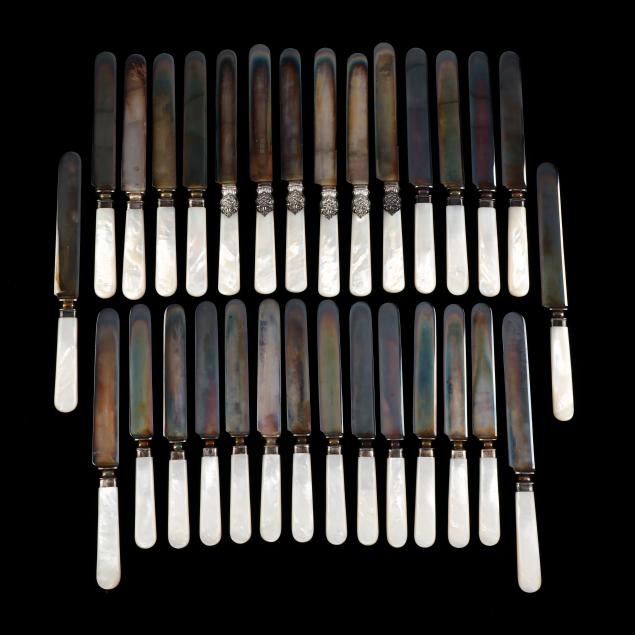 an-assembled-set-of-mother-of-pearl-handled-knives