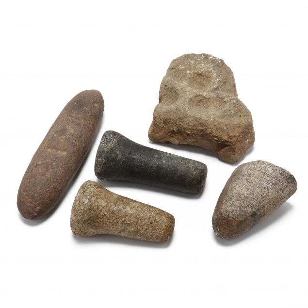 four-ancient-stone-pestles-and-a-nutting-stone