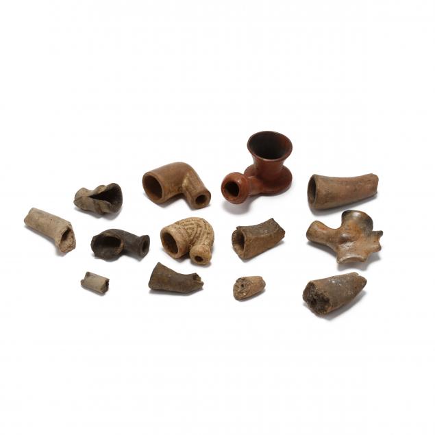 three-clay-trade-pipes-a-catawba-pipe-and-a-grouping-of-pipe-fragments