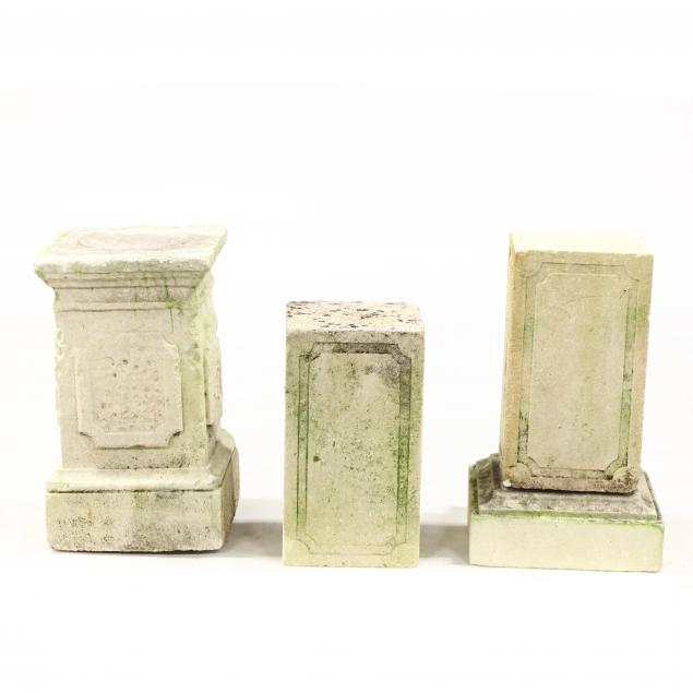 three-cast-stone-garden-pedestals