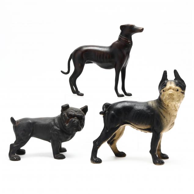 three-canine-figures