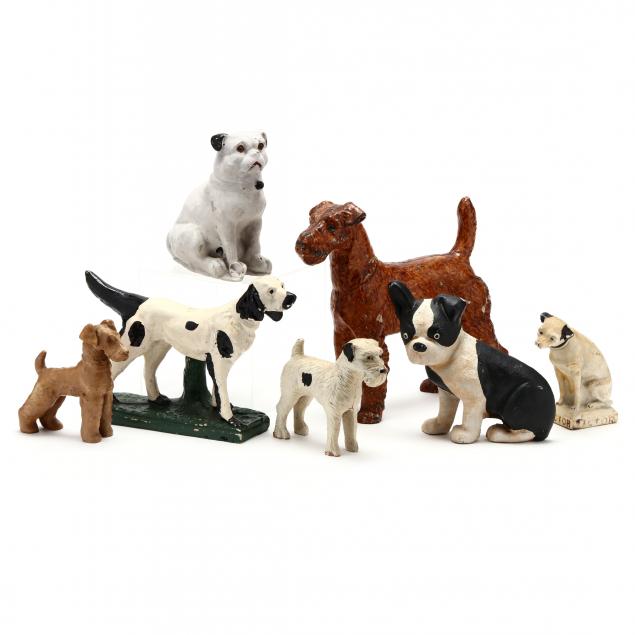 a-group-of-seven-canine-figures