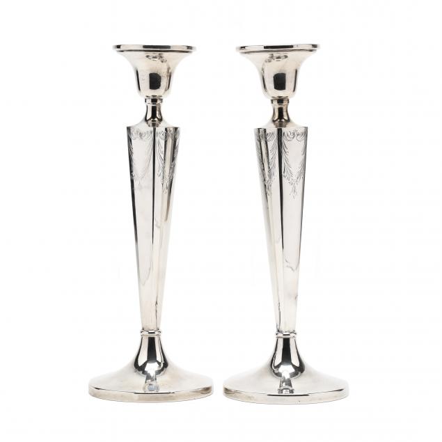 a-pair-of-neoclassical-style-sterling-silver-candlesticks