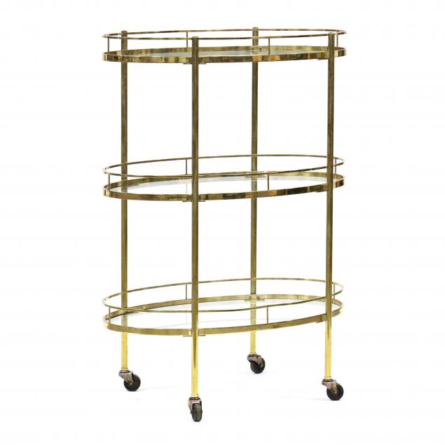 a-tall-three-tiered-brass-serving-cart