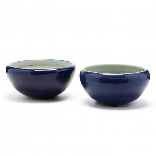 a-pair-of-chinese-monochrome-glazed-cachepots