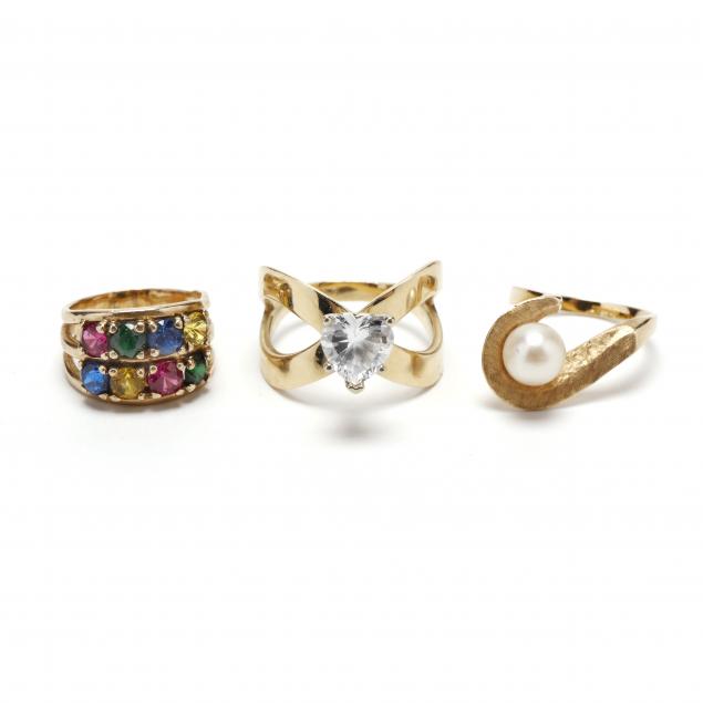 three-gold-gemstone-rings