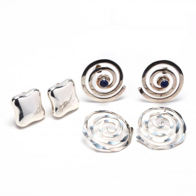 three-pairs-of-silver-earrings