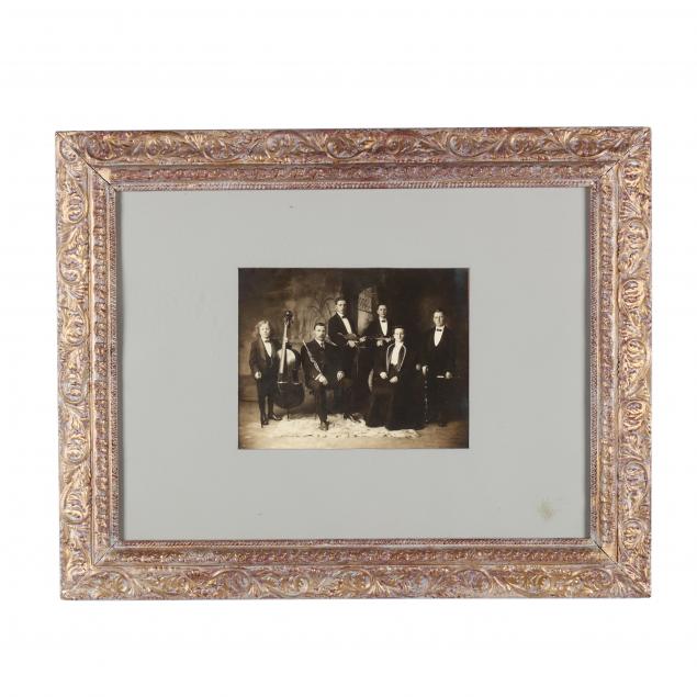antique-photographic-portrait-of-a-family-band
