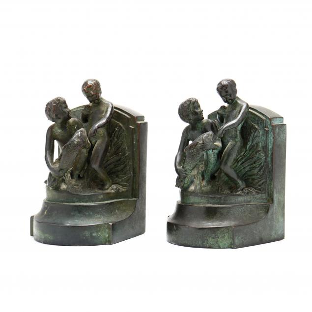 vintage-bronze-tone-souvenir-bookends-from-the-stevens-hotel