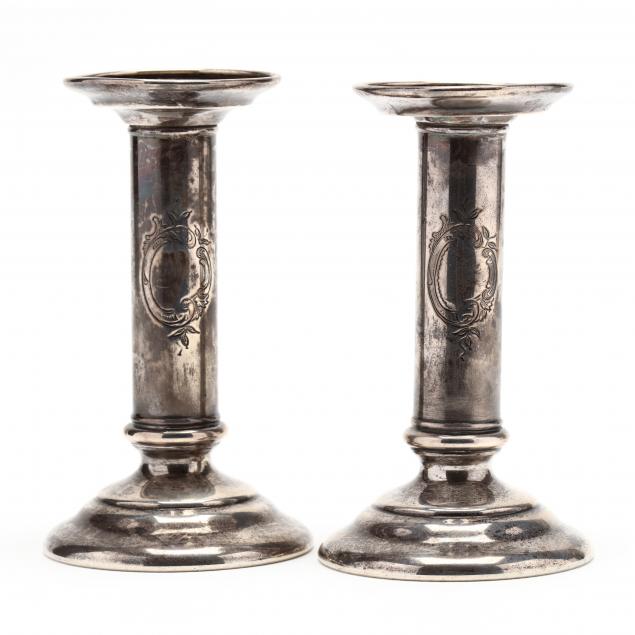 a-pair-of-tiffany-co-sterling-silver-candlesticks