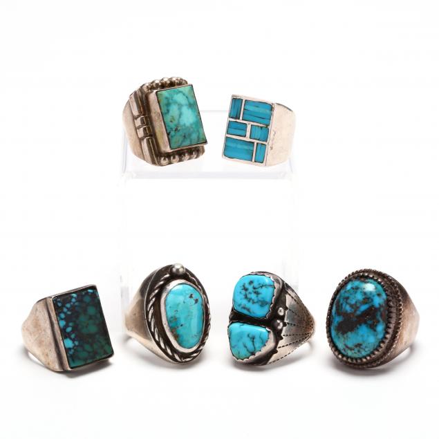 a-collection-of-six-turquoise-and-silver-rings