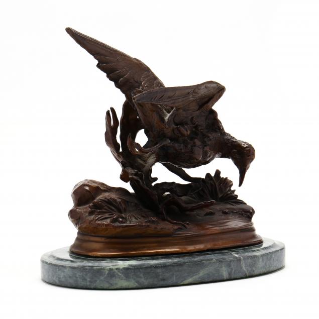 bronze-sculpture-of-a-game-bird-in-motion