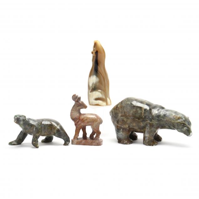 four-carved-woodland-animals