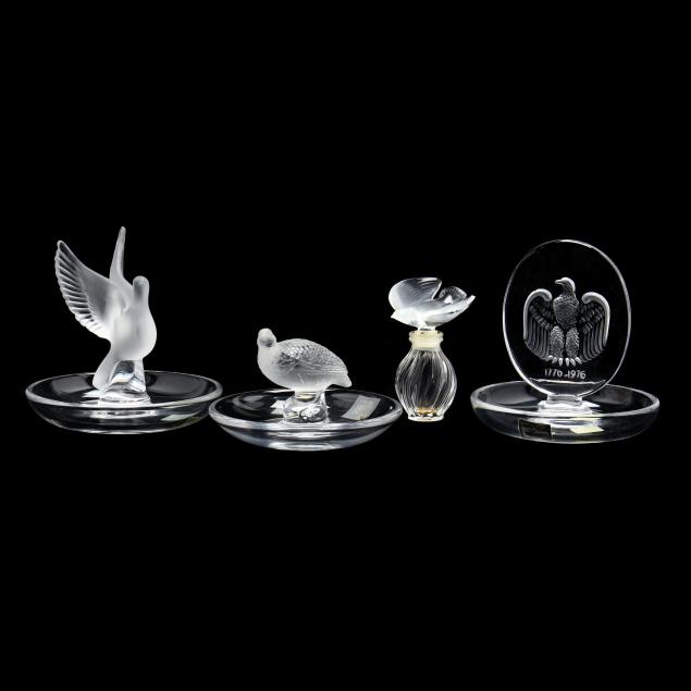 three-lalique-jewelry-dishes-and-a-miniature-perfume-bottle