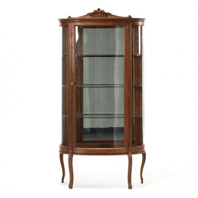 edwardian-carved-oak-bow-front-china-cabinet