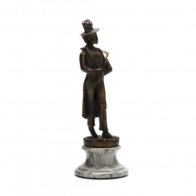 bronze-statue-of-a-dapper-dog