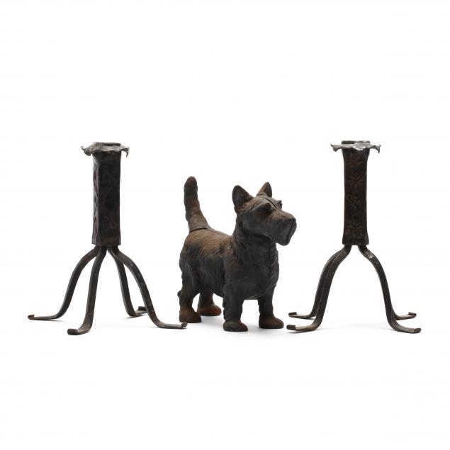 pair-of-swedish-arts-and-crafts-iron-candlesticks-and-doorstop