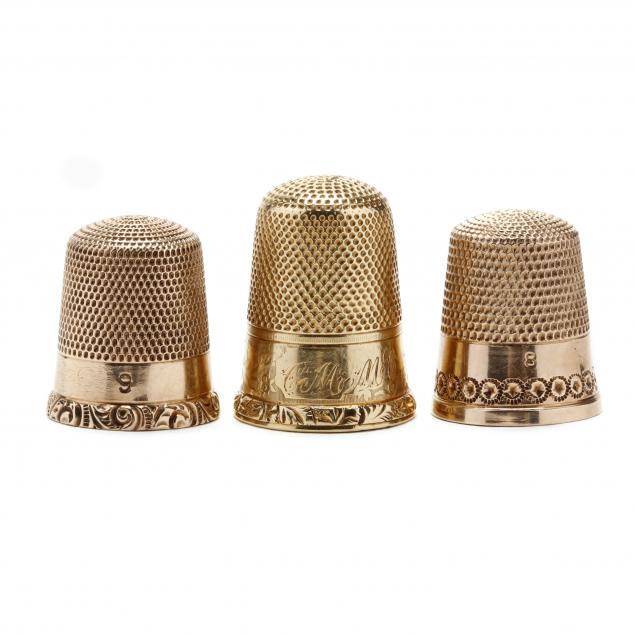 three-antique-gold-thimbles