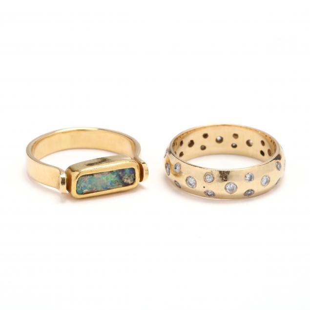 two-gold-and-gemstone-rings