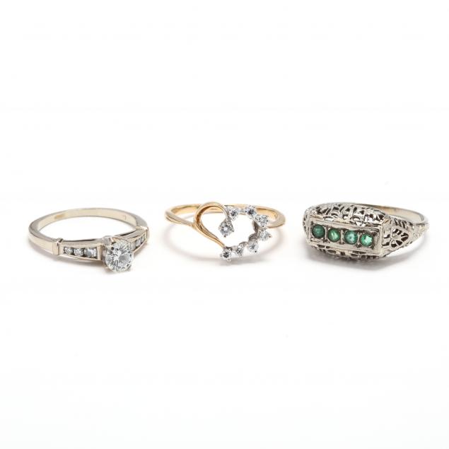 three-gold-diamond-and-gemstone-rings