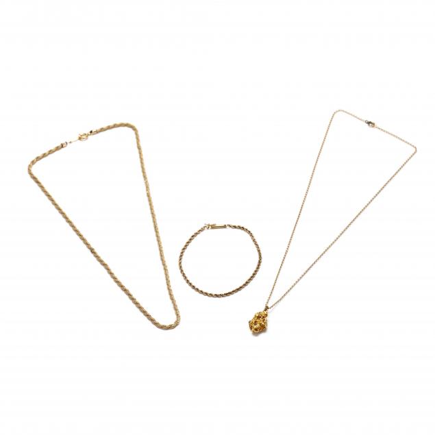 three-gold-jewelry-items