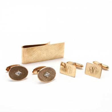 two-pairs-of-gold-cufflinks-and-a-gold-money-clip