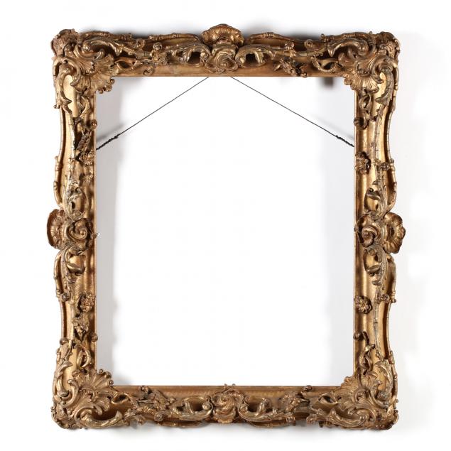 an-antique-ornate-gilt-composition-frame