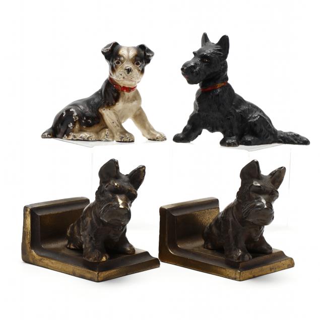 three-vintage-metal-dog-bookends-and-doorstops