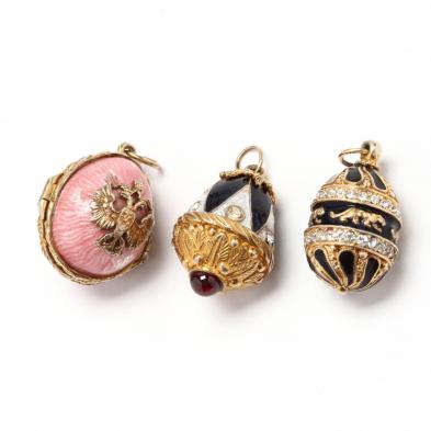 three-faberge-style-vermeil-enamel-and-gem-set-egg-pendants