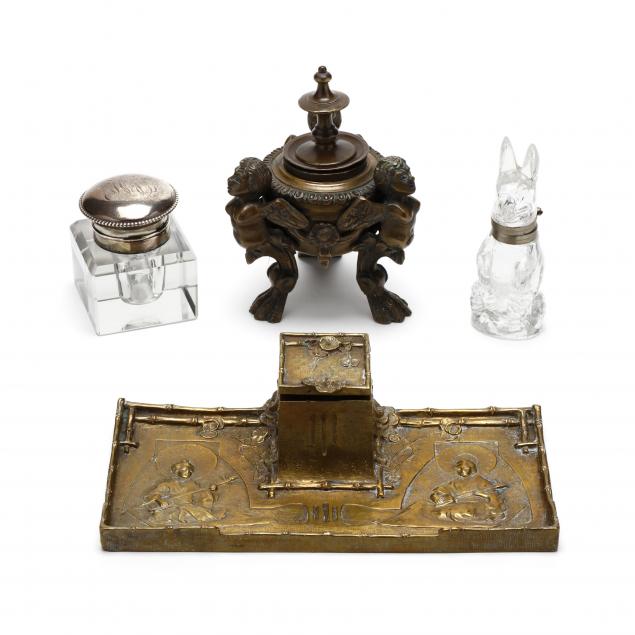 a-collection-of-four-antique-inkwells