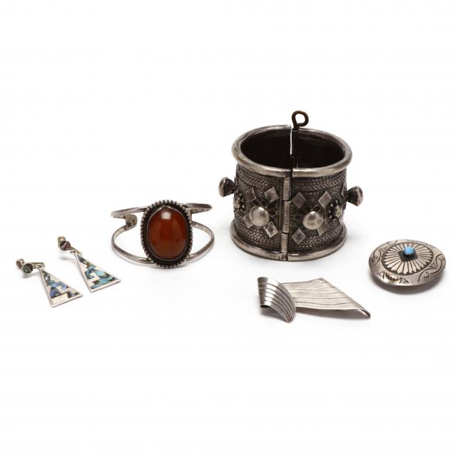 group-of-silver-jewelry-items