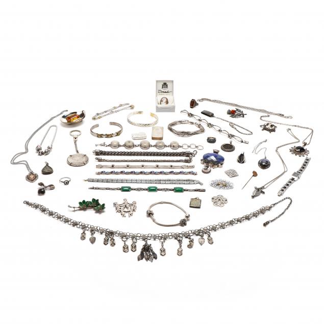 group-of-mostly-silver-jewelry-items
