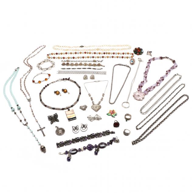 group-of-mostly-silver-jewelry-items