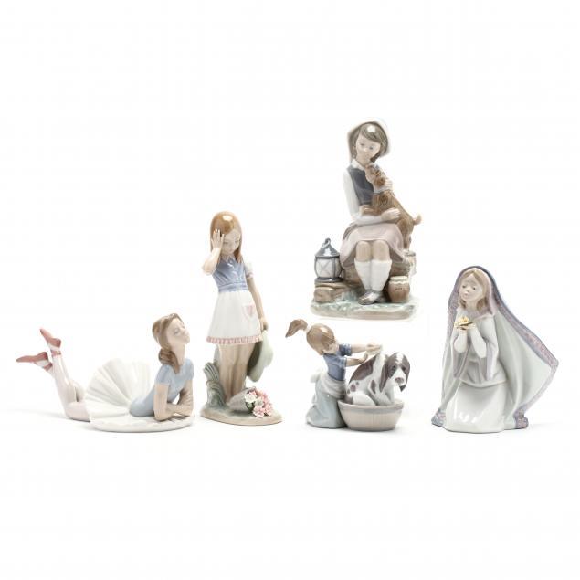 a-group-of-lladro-figurines-of-young-girls
