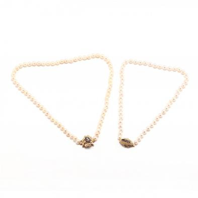 two-single-strand-pearl-necklaces-with-14kt-gem-set-clasps