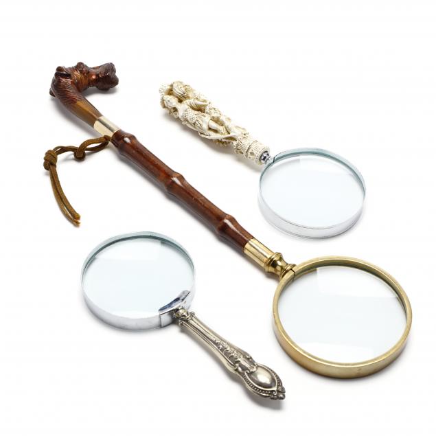 three-antique-magnifying-glasses