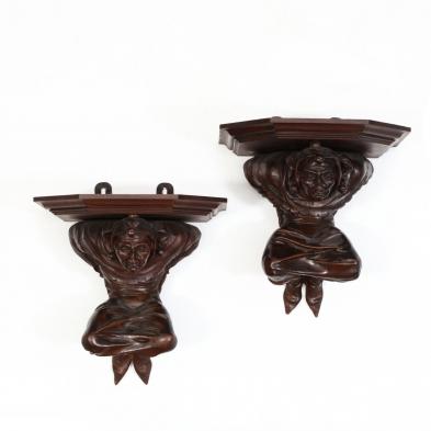 pair-of-renaissance-style-carved-jester-wall-brackets