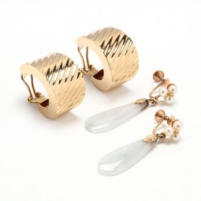 two-pairs-of-gold-earrings