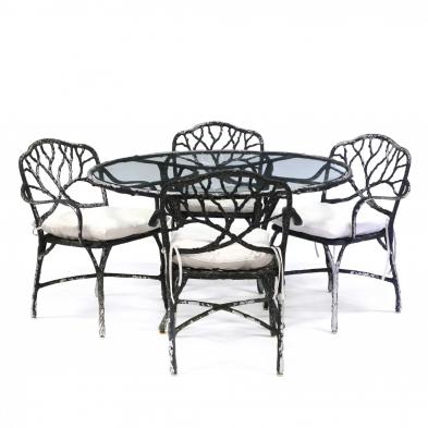 faux-bois-cast-aluminum-patio-table-and-four-chairs