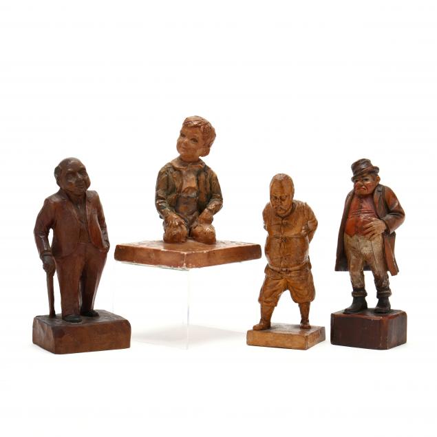 four-carved-figures