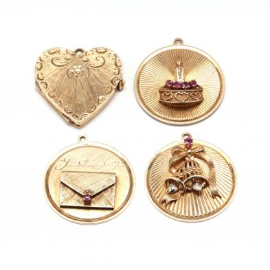 three-vintage-14kt-gold-charms-by-henry-danker-and-a-14kt-heart-locket-charm