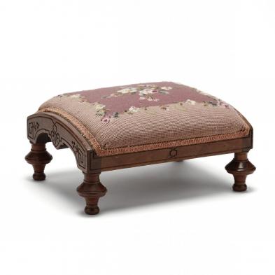 an-eastlake-carved-walnut-footstool