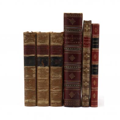 six-antique-leather-bound-books-and-magazines