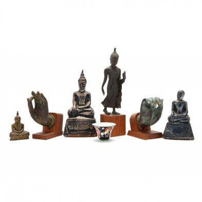 a-group-of-asian-buddhist-sculptures