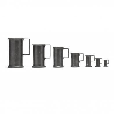 set-of-seven-graduated-pewter-measures