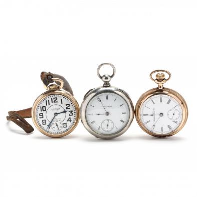 three-vintage-pocket-watches